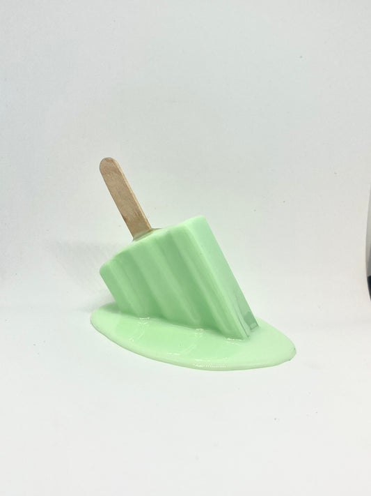 Green melting popsicle resin sculpture
