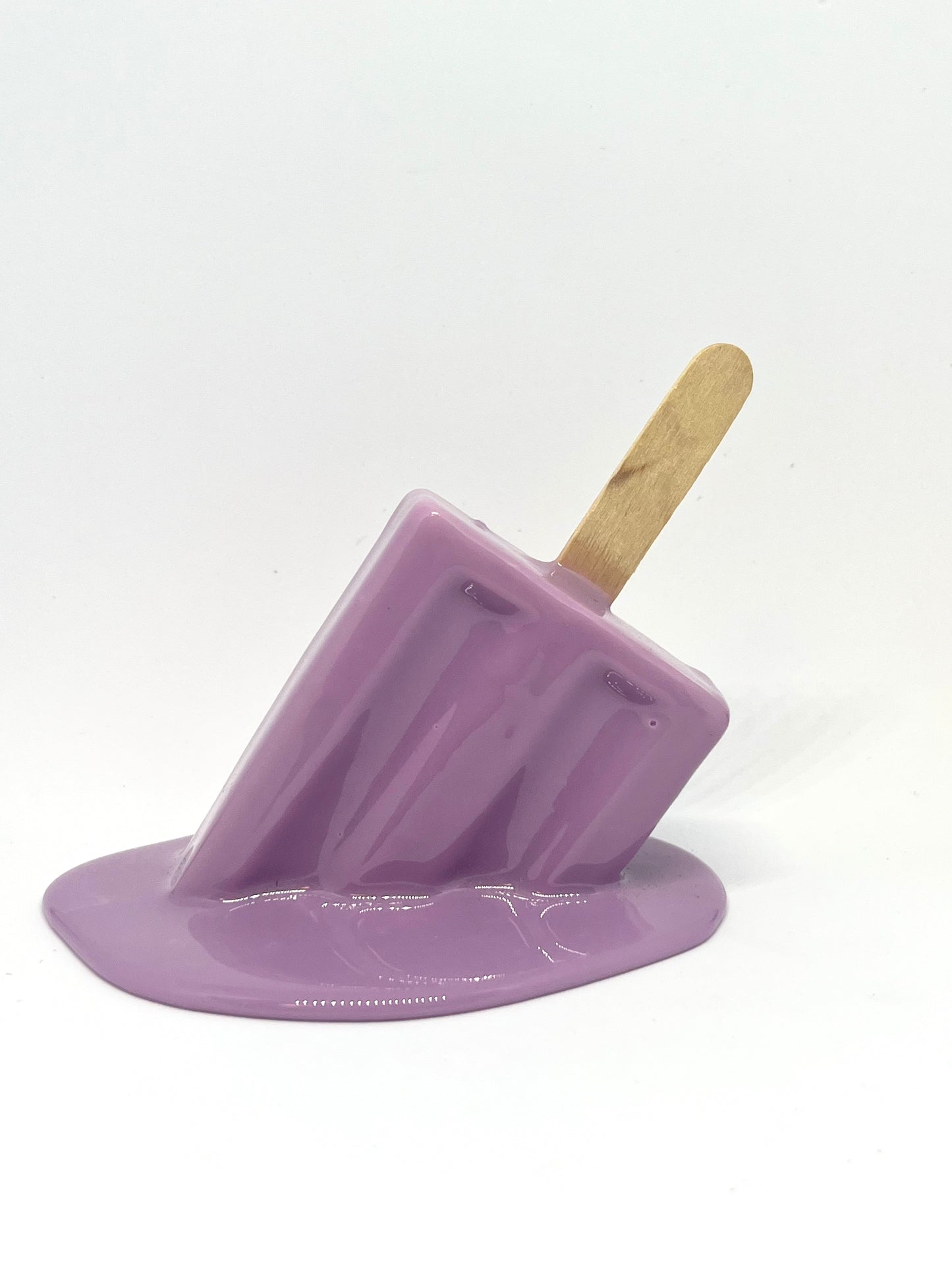 Purple melting popsicle resin sculpture