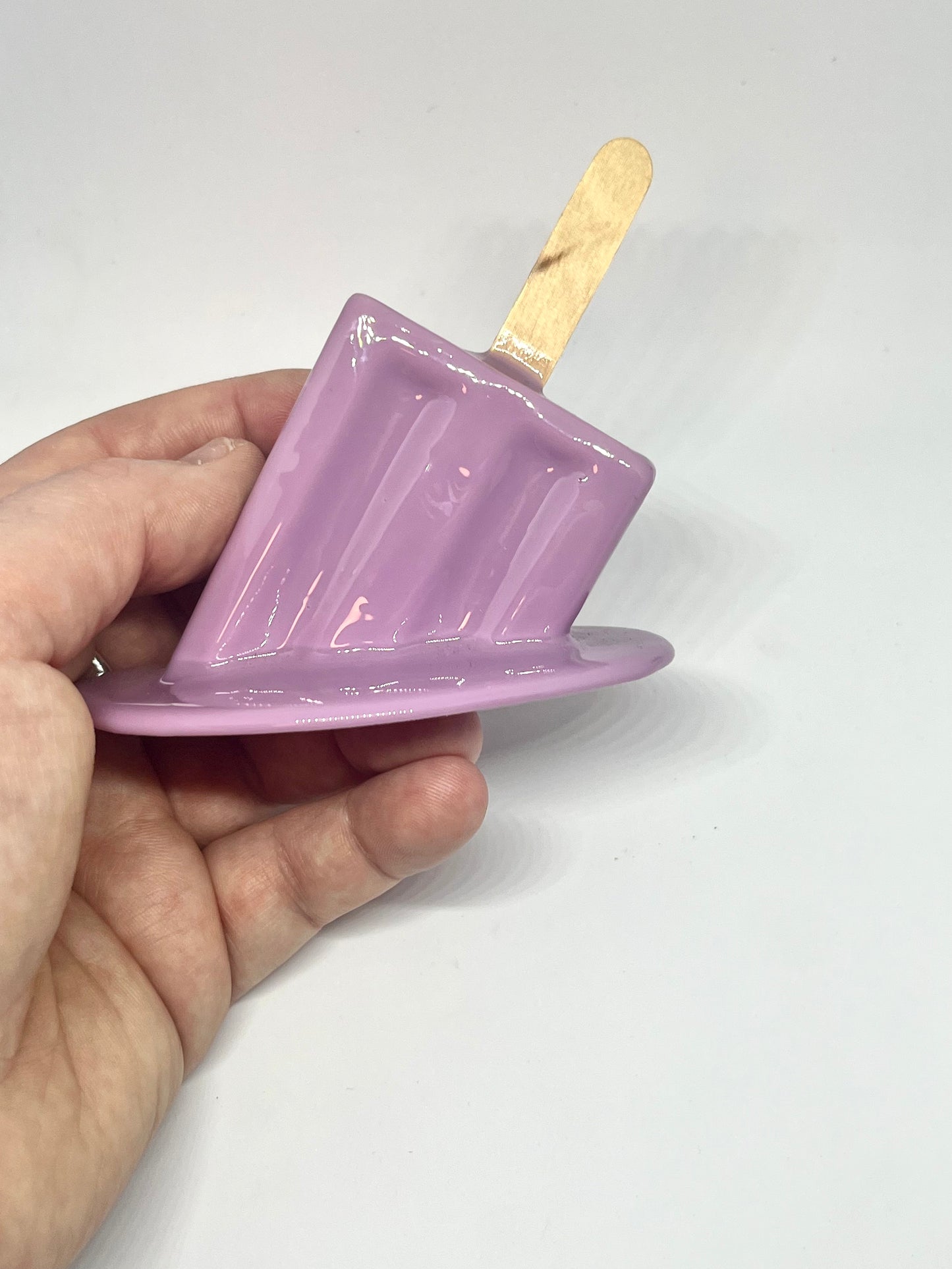 Purple melting popsicle resin sculpture