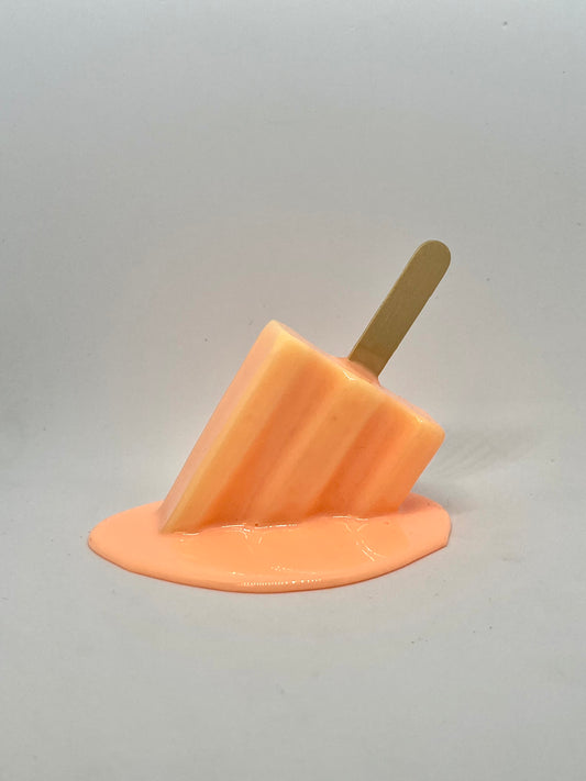 Orange melting popsicle resin sculpture