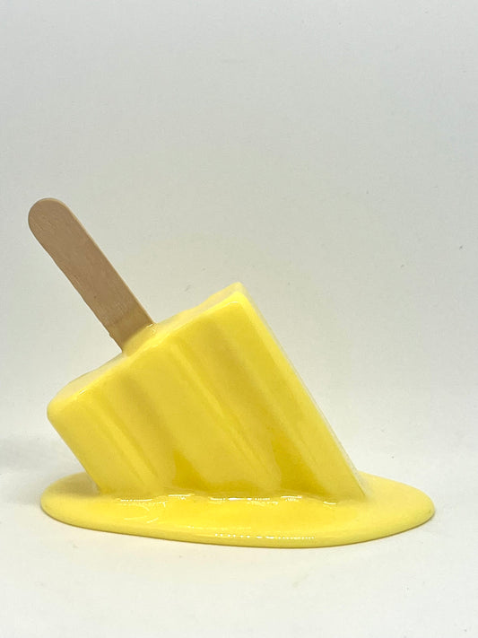 Yellow melting popsicle resin sculpture