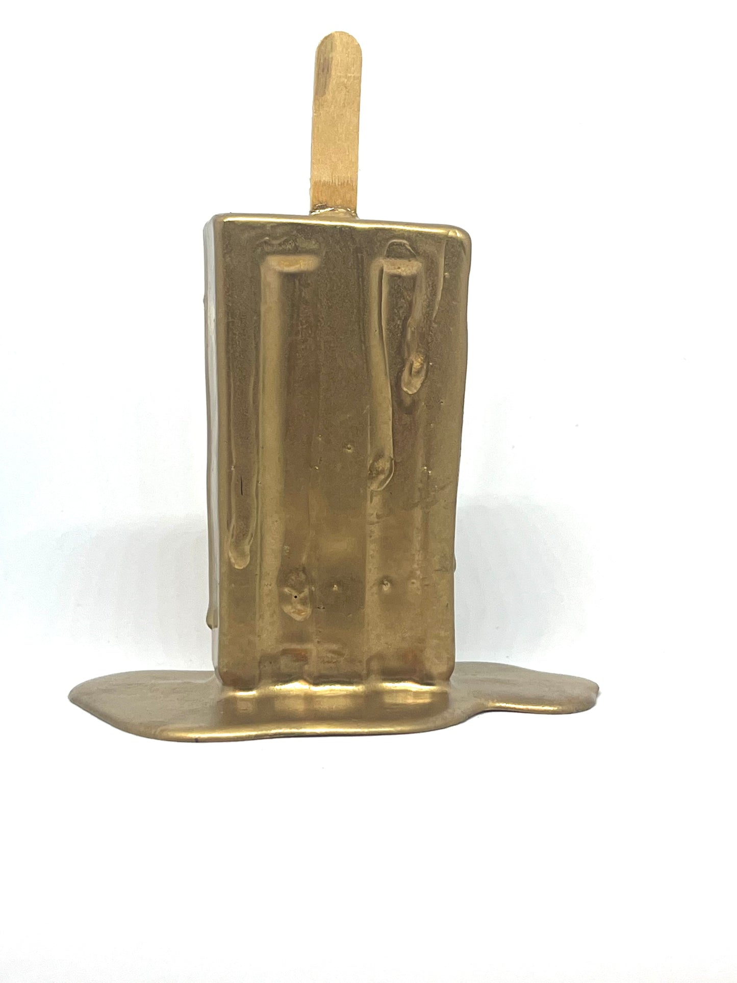Gold melting popsicle resin sculpture