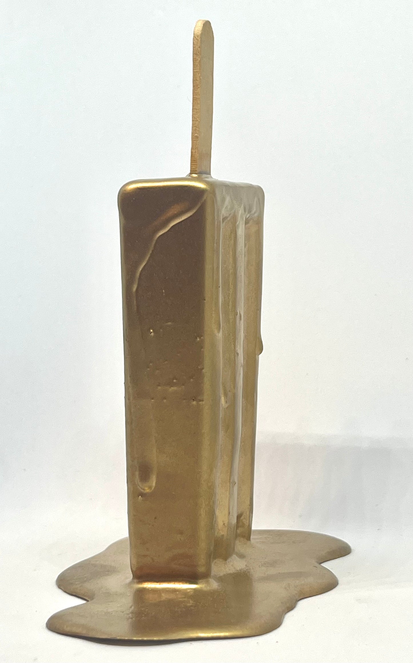 Gold melting popsicle resin sculpture