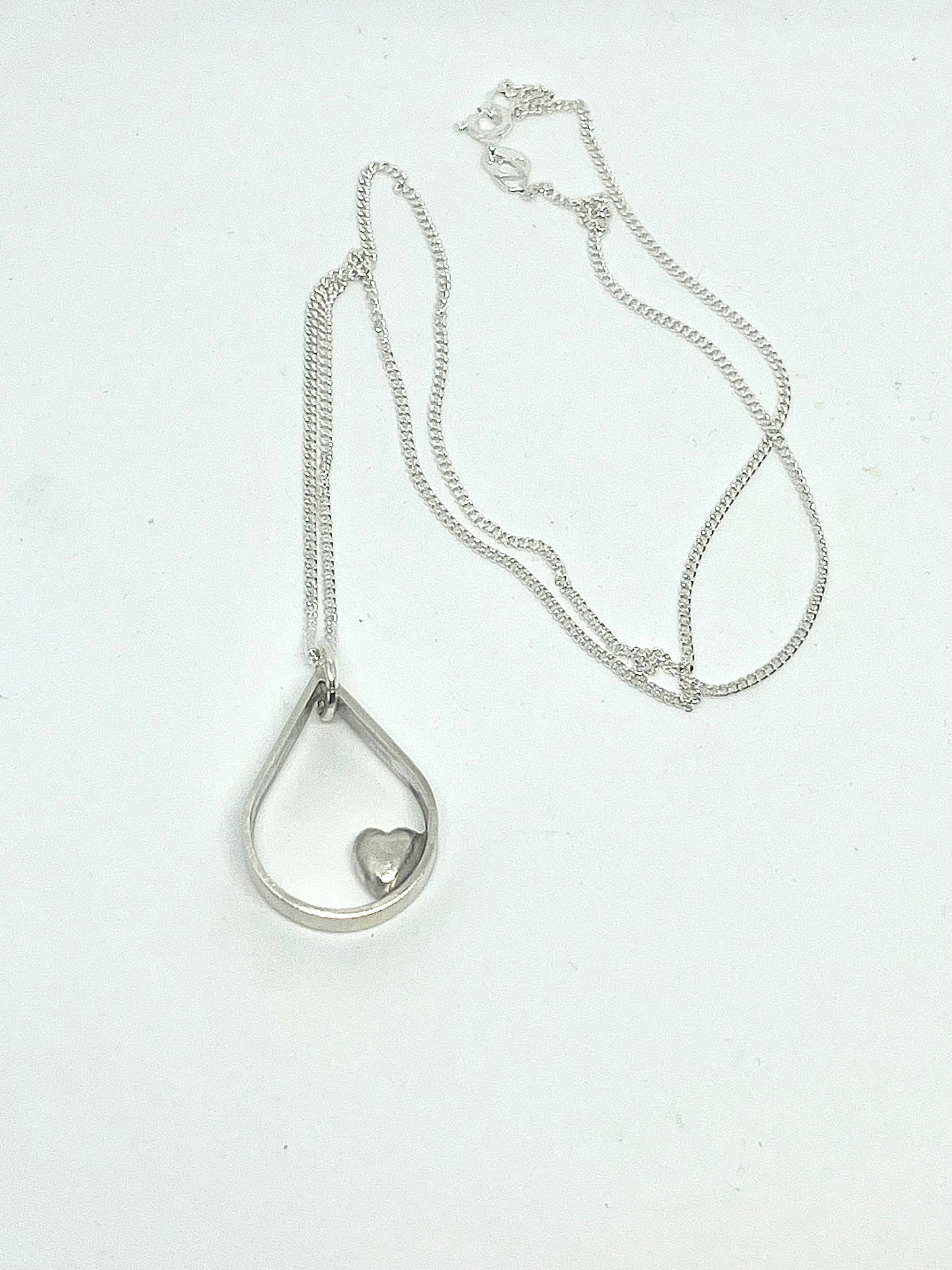Silver drop pendant with heart
