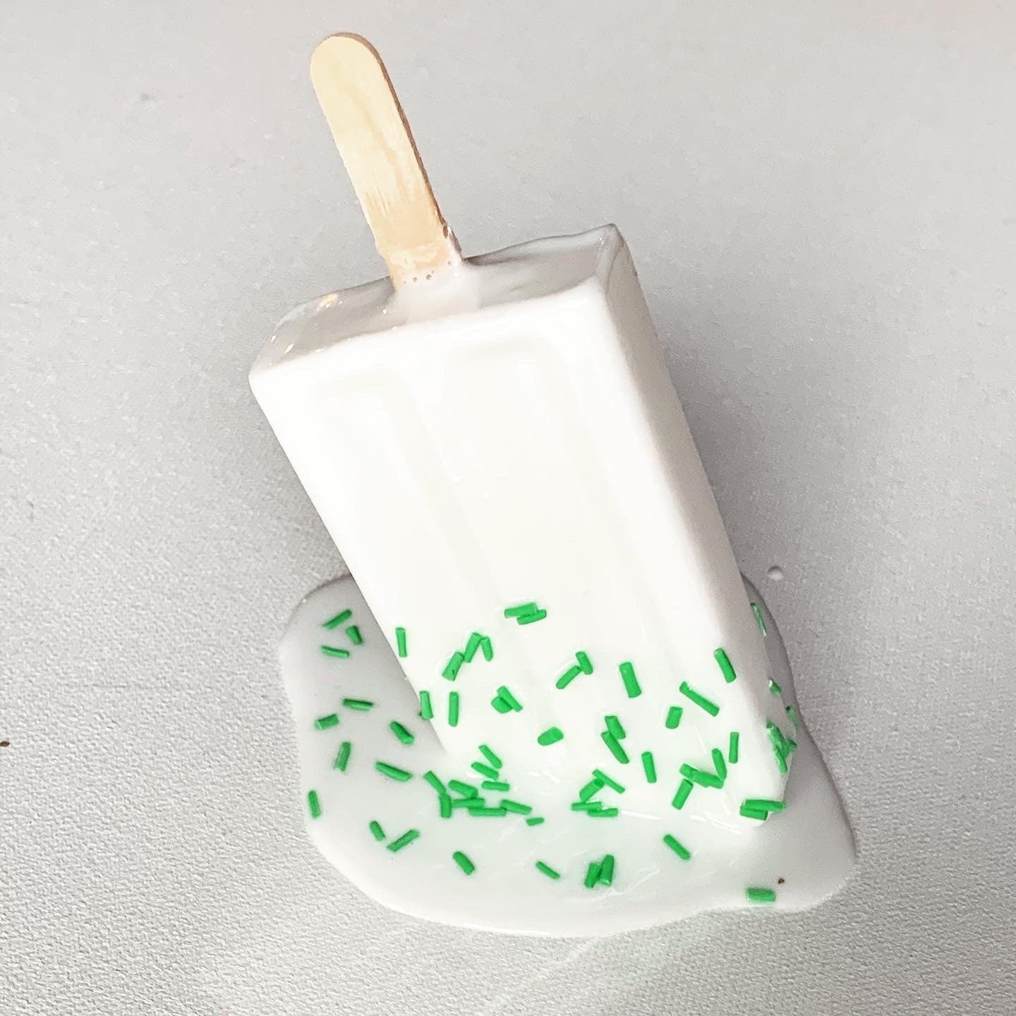 White Sprinkled Melting Popsicle Resin Sculpture