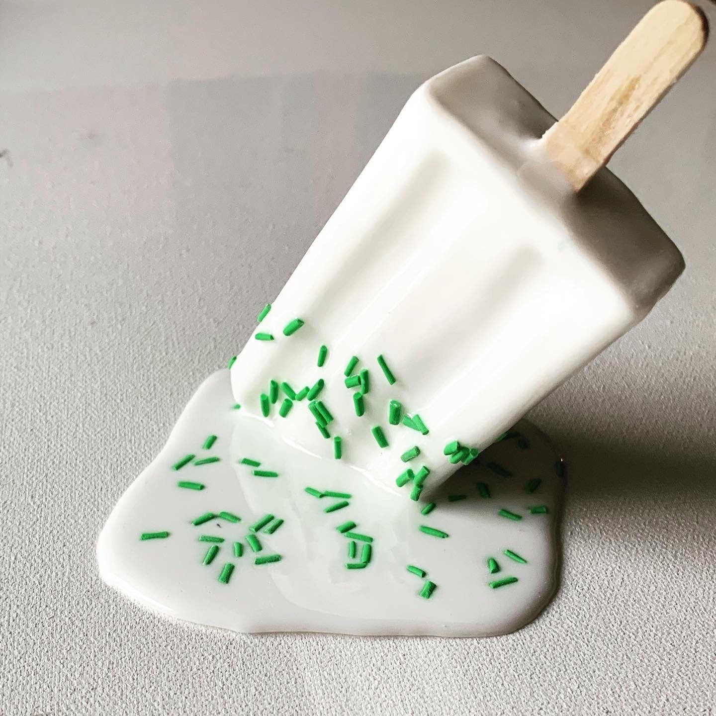 White Sprinkled Melting Popsicle Resin Sculpture