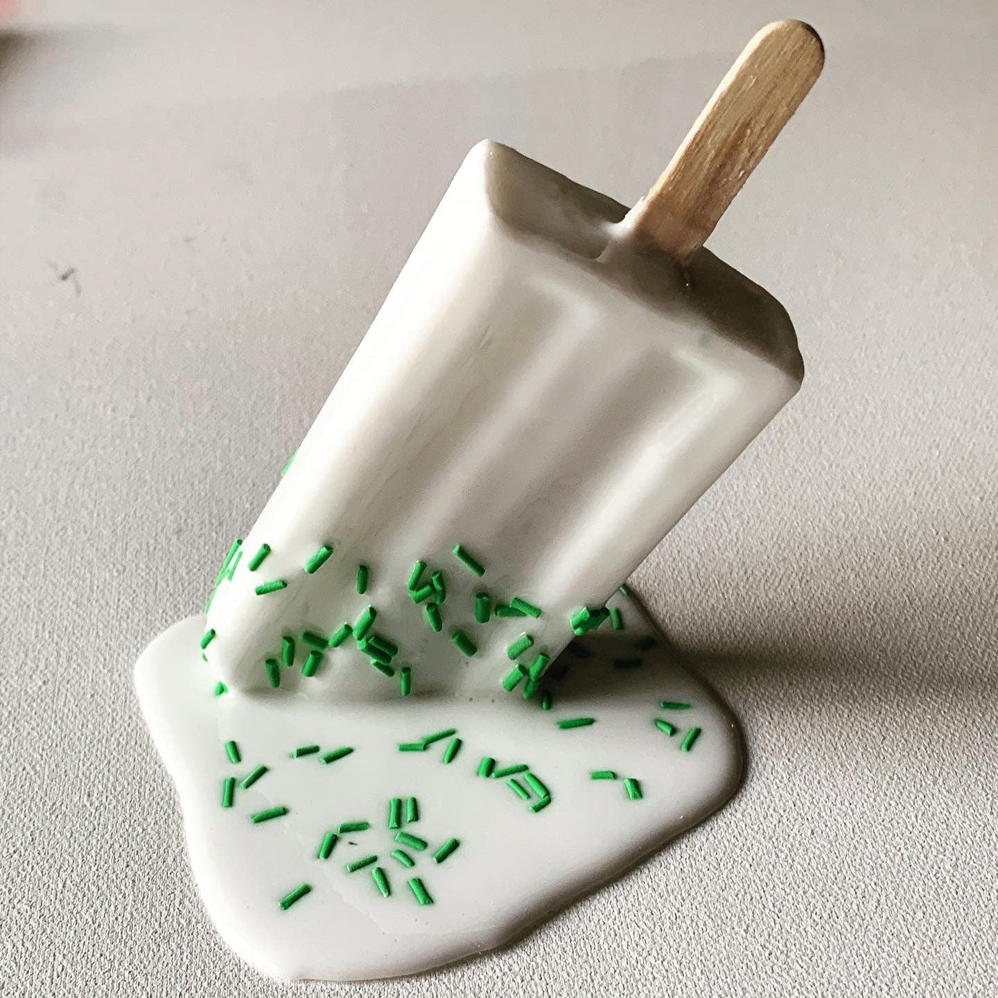 White Sprinkled Melting Popsicle Resin Sculpture
